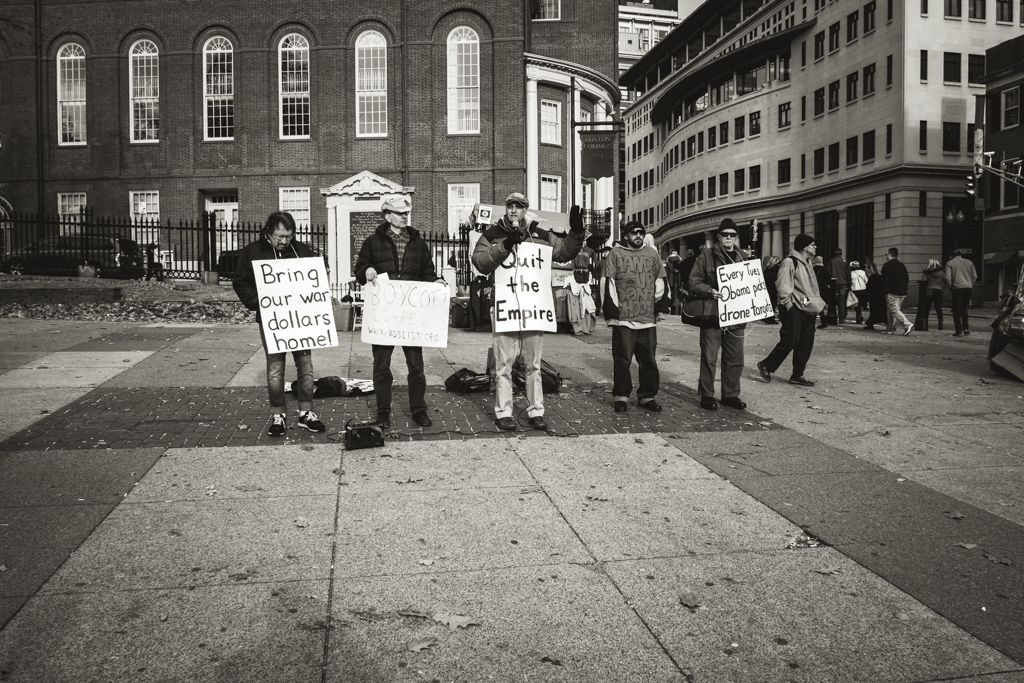 Protestors protesting about something at the Boston Common.