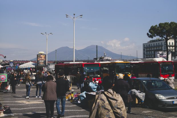 Mt. Vesuvius looming over Naples and the Naples Central Train Station