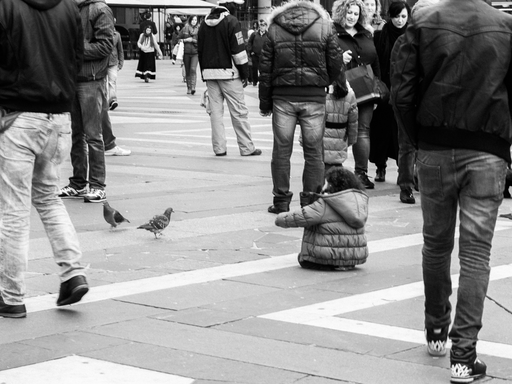 Girl Feeding Pigeons at Piazza Duomo
